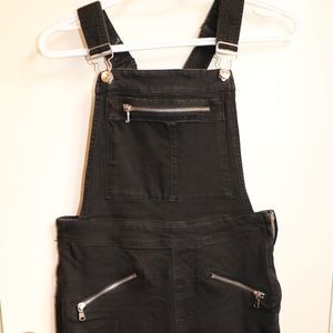 Black overall skinny leg